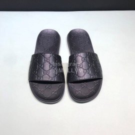 Gucci Black Leather Embossed Slippers For Men 