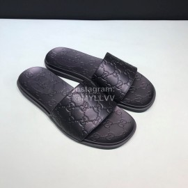 Gucci Black Leather Embossed Slippers For Men 