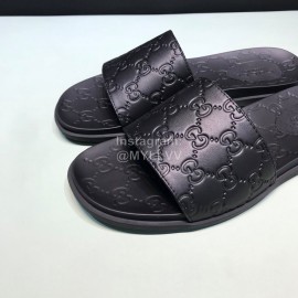 Gucci Black Leather Embossed Slippers For Men 