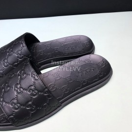 Gucci Black Leather Embossed Slippers For Men 